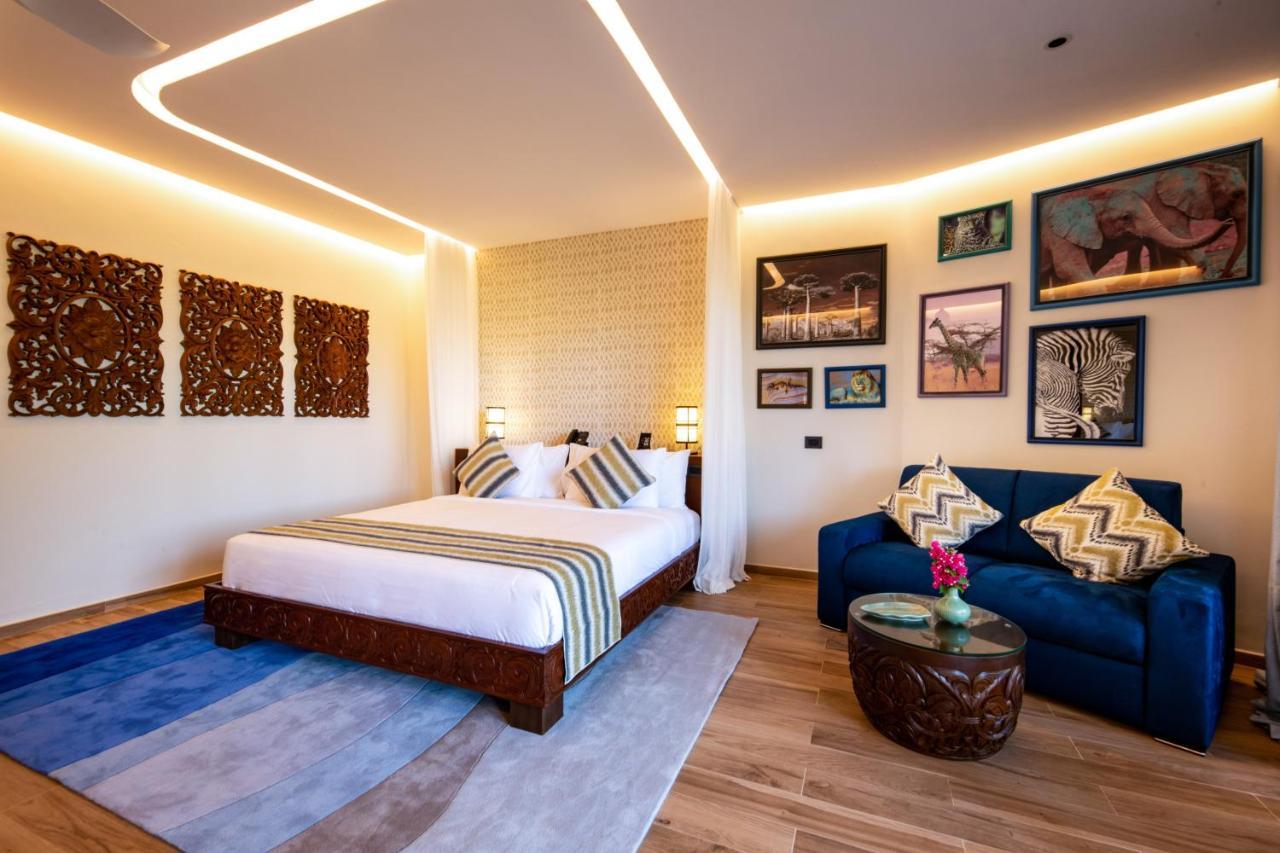 The Mora Zanzibar Hotel Matemwe  Kültér fotó A bedroom at the hotel
